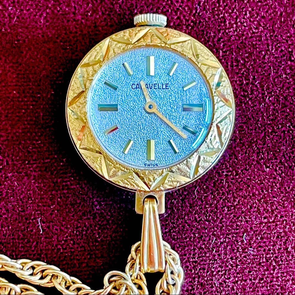 Charming, beautiful vintage Caravelle pendant watch. Works well!